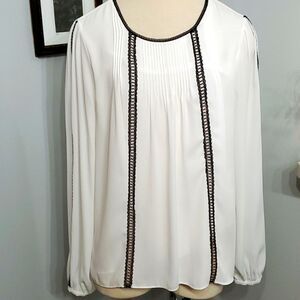 White house black market elegant white blouse with black trim.‎ Size large.